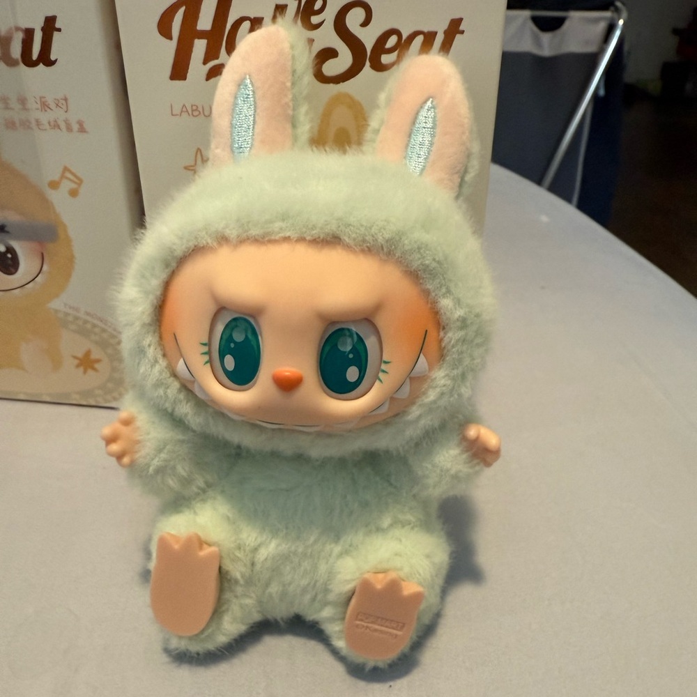 Labubu Have A Seat Ququ. 

Item filmed packaged and sent at USPS location